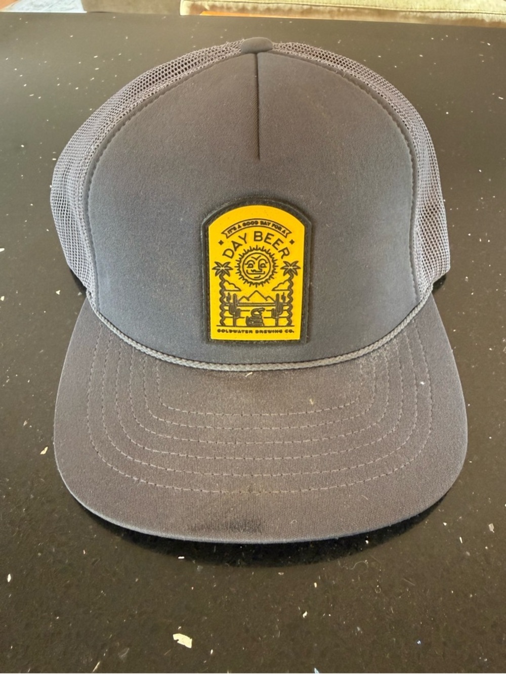 It’s a Good Day for a Day Beer Patch Trucker Hat - Black with Yellow Patch